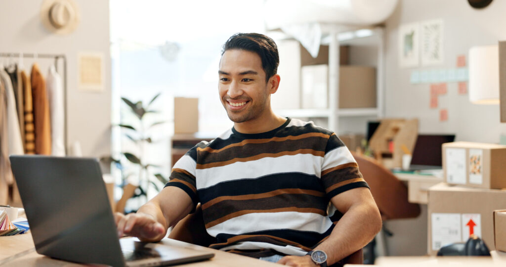 A California small business owner at a desk reviewing paperwork and a calendar, symbolizing the importance of meeting the Statement of Information deadline.