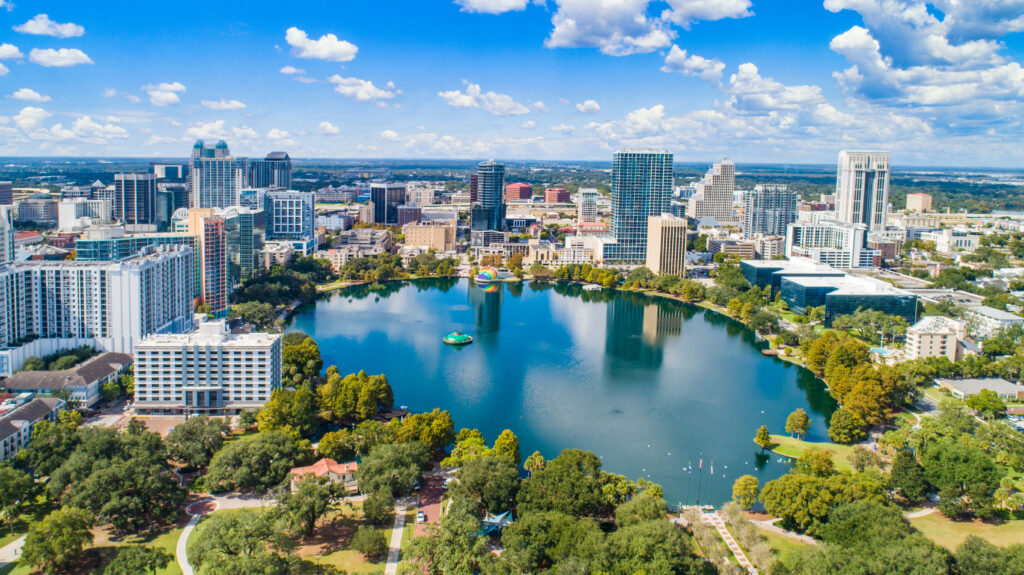 Florida business owner reviewing Annual Report filing documents in a home office to avoid late fees in 2026